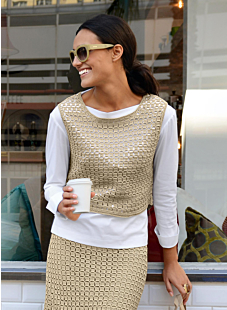 Cat. 13/14 - nr. 775 Mouwloze pull en rok